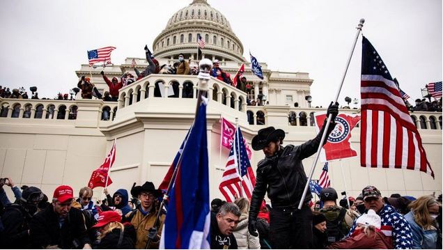 FBI hunts more suspects and charges more than 535 people over US Capitol riot to court 2 1 28